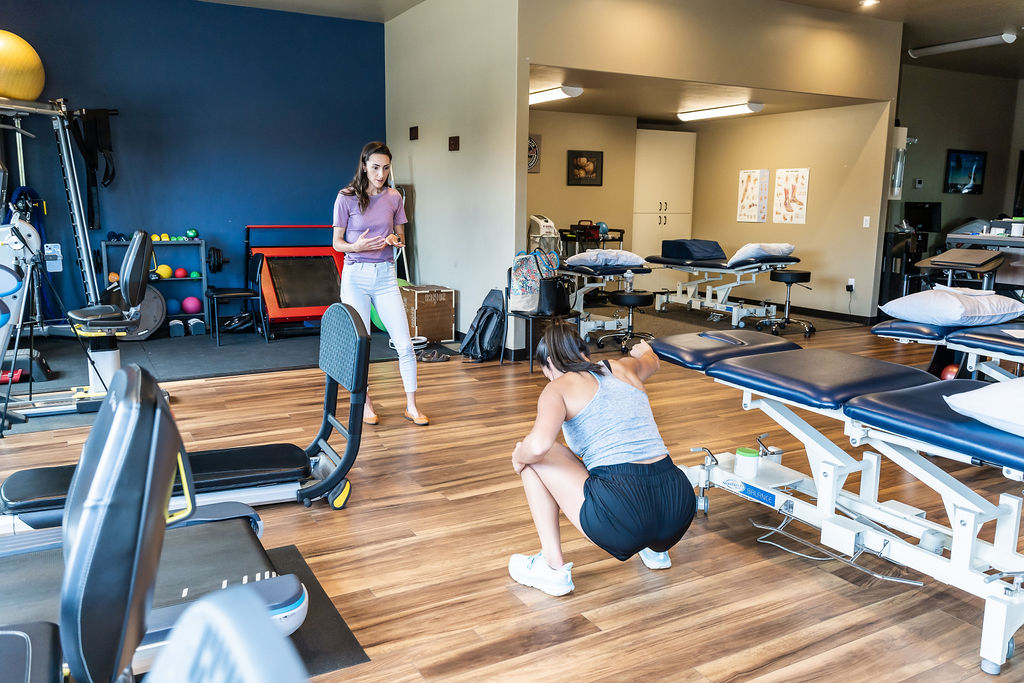 Dr. Maria Leibler working with a patient during a physical therapy session.