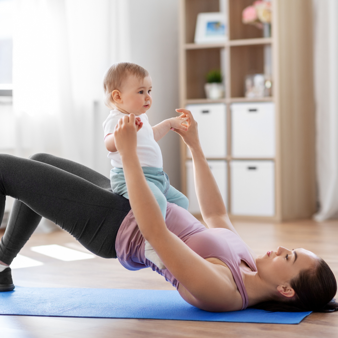 Active mother exercising with her child