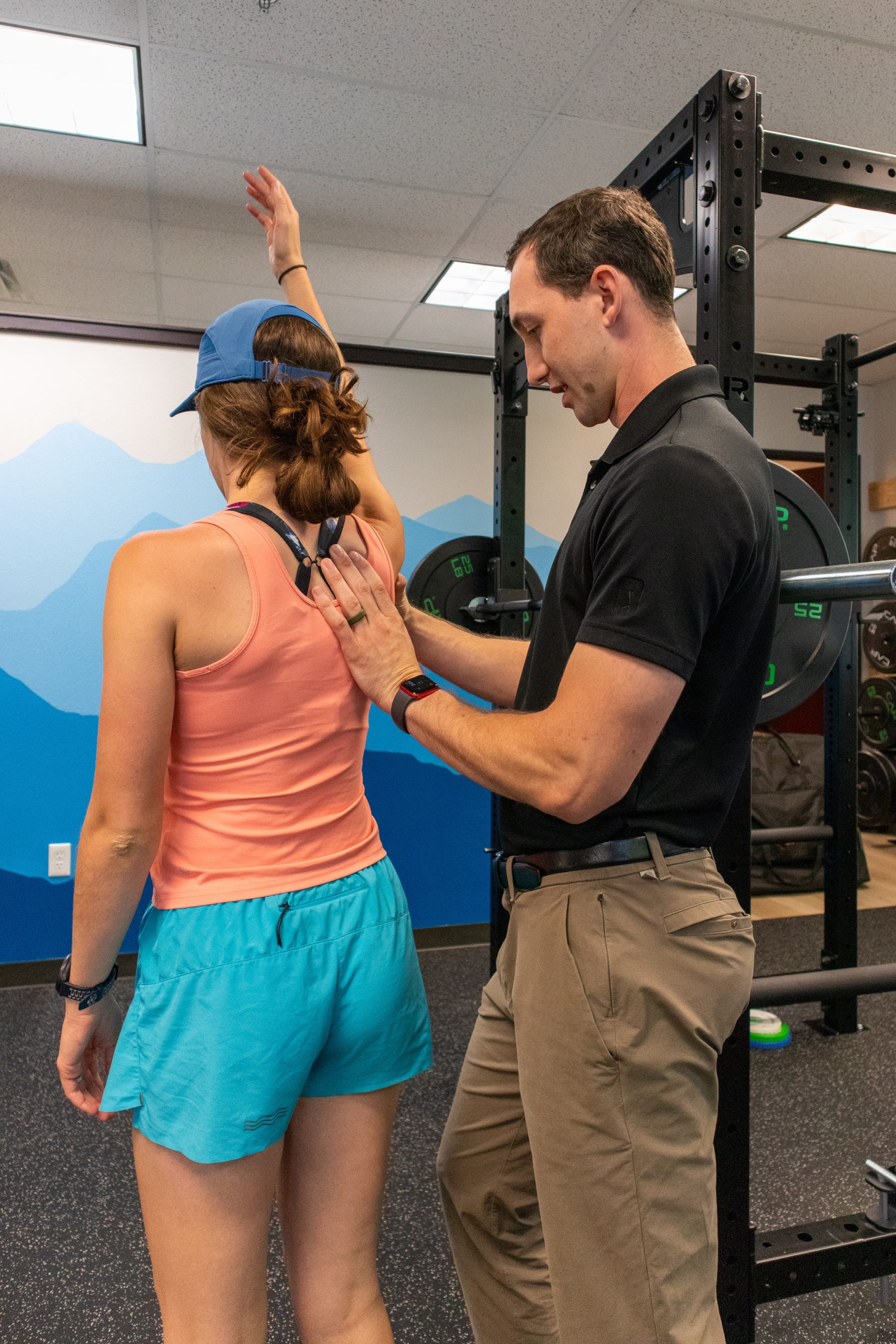 Dr. Ryan Schwab assessing a patient's movement at Fit & Function Therapy Solutions in Boise